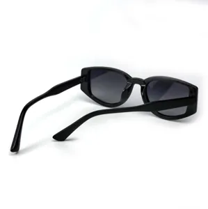 Detail view of retro women polarized sunglasses with black frame and UV protection lenses.