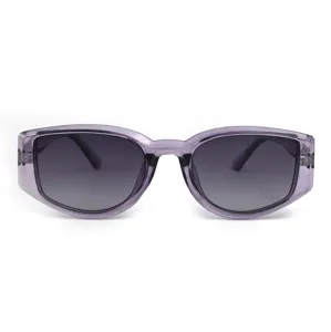 Detailed view of trendy translucent purple frame sunglasses with gradient dark lenses.
