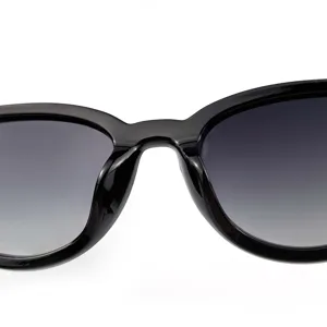 Black frame gradient lens sunglasses detail view, sleek retro eyewear closeup shot