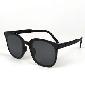 Lunettes de soleil pliantes noires avec verres polarisés, monture carrée tendance.