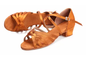Children satin Latin dance shoes detail view, soft sole low heel tan practice shoes.