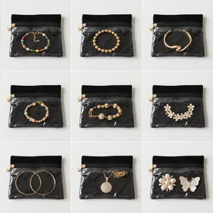 Detail shot of various exquisite jewelry pieces displayed in transparent storage bags.