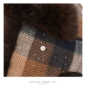 Close-up detail of retro plaid knit trapper hat with soft faux mink fur and button.