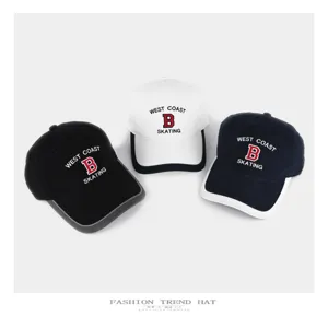 Korean style color contrast baseball cap detail showing embroidery letters and brim trim.