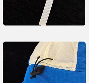 Gros plan détaillé du chapeau d'extérieur montrant le tissu à carreaux et cordon noir.