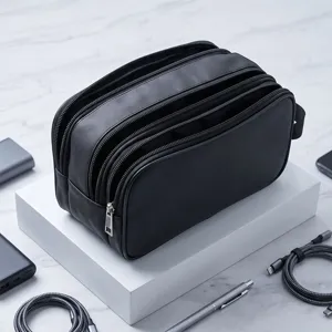 Multi-compartment black travel toiletry bag detail view, premium storage pouch for daily use.