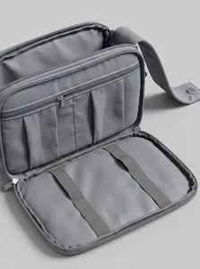 Gray travel toiletry bag cosmetic organizer multi compartment storage pouch portable case.