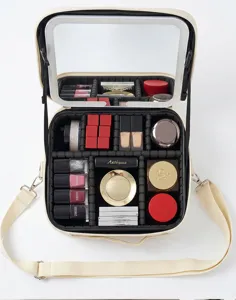 Large capacity portable makeup bag with LED lighted mirror, adjustable dividers and shoulder strap.