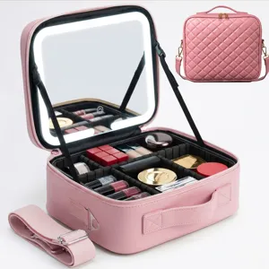 Pink PU leather makeup train case with LED lighted mirror, large capacity and adjustable dividers.
