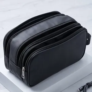 Black multi-compartment travel toiletry bag, large capacity makeup organizer and shaving storage pouch