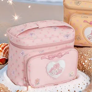 Pink floral travel cosmetic bag large capacity PU portable storage bag with cute heart motif.