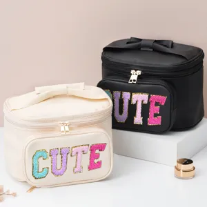 Portable cosmetic bag with cute letter embroidery, bow decor, large capacity makeup storage box.