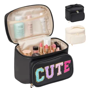 Large capacity travel makeup bag with cute letter patch, multi-compartment cosmetic organizer.