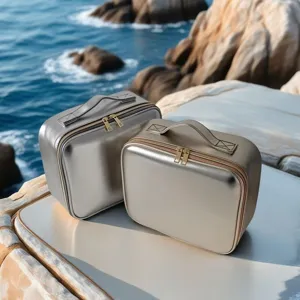 Portable metallic cosmetic bag set, travel toiletry storage case with handle and zipper.