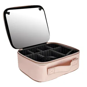 Travel makeup train case with large mirror and adjustable dividers, rose gold portable cosmetics bag.