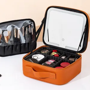 Portable PU leather makeup case with LED lighted mirror and adjustable dividers for travel.