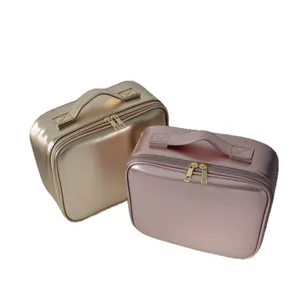 Portable metallic cosmetic bag set with zipper and top handle for travel and daily storage.