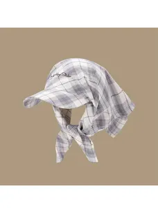 Detailed view of the stylish plaid sun protection baseball cap with attached headscarf.