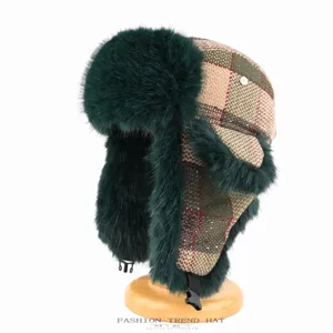Winter warm plaid trapper hat with green faux fur earflaps, cozy thick bomber hat for cold weather.