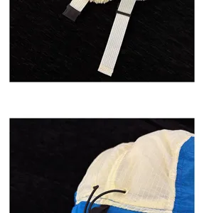 Détail de bonnet aviateur thermique d'hiver, tissu quadrillé pelucheux et coupe-vent.