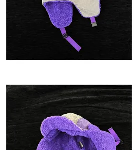 Vue detaillee bonnet aviateur chaud d'hiver, tissu peluche colorblock avec oreillettes.