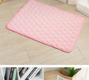 Pink flannel pet warming mat with heart quilted pattern, soft dog and cat sleeping bed.