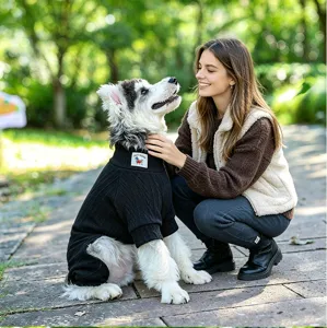 Detailed view of a stylish black four-leg pet sweater knitwear for dogs and cats.