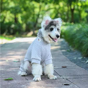Cozy grey cable-knit pet sweater detail, soft knitted fabric for small dogs and cats.