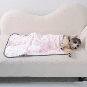 Cute pet blanket for dogs and cats, thick warm winter sleeping mat with pink cartoon rabbit print.