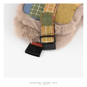 Retro colorful plaid plush trapper hat detail view, warm winter fleece ear protection cap.