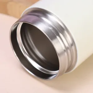 Stainless steel portable pocket thermos cup detail view showcasing inner rim and threading quality.