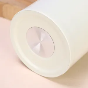 Detailed shot of the compact 304 stainless steel thermos cup bottom in solid white.