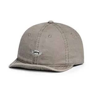 Detail view of the stylish grey short brim cotton cap featuring a neat embroidered logo patch.
