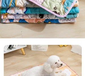 Cute cartoon printed pet mat detail, soft quilted dog sleeping pad with non-slip bottom.