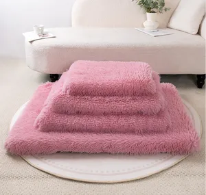 Detailed view of soft pink fluffy pet bed stack in cozy living room setting interior style.