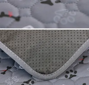 Washable pet pee dog mat with non-slip backing, absorbent quilted training pad for pets.