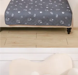 Washable pet pee pad with cute dog and bone print, thickened waterproof dog training mat.