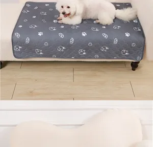 Grey thickened pet pee pad detail view, absorbent washable dog training mat with cute patterns