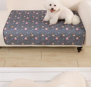 Reusable waterproof dog pee pad with cute witch dog print, washable pet training mat.