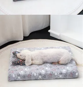 Grey paw print flannel dog pet sleeping mat detail view, soft winter warm puppy bed for home.