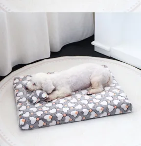 Plush dog pet bed warm flannel mat with cute heart pattern and small pillow for small dogs.