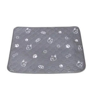 Washable grey pet pee pad with cute dog and bone prints for daily puppy training use.
