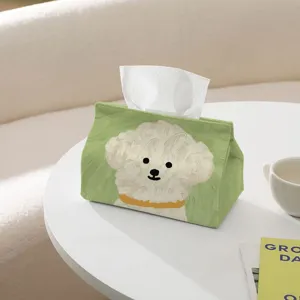 Green fabric tissue box featuring cute curly puppy oil painting design, soft home decor item.