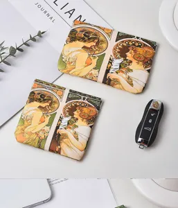 Retro Art Nouveau style spring-clip storage pouch for data cables, cosmetics, and coins.