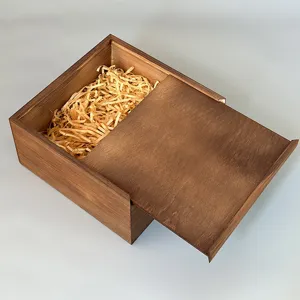 Wooden sliding lid gift box with wood shavings filling, ideal for wedding favors or storage.