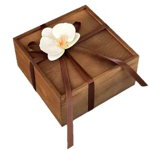 Wooden gift box with orchid and ribbon, elegant wedding candy storage box for packaging.