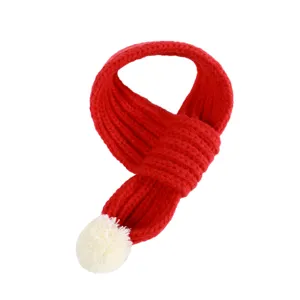 Cute winter pet knitted red scarf with white pompom, warm and comfortable for cats and dogs.