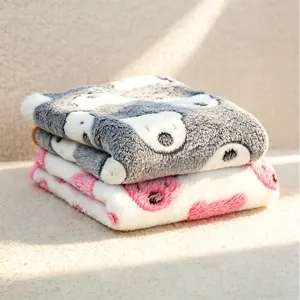 Soft flannel pet blanket with cute paw print design, warm cozy dog and cat sleeping mat.