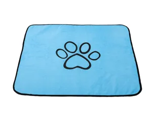 Blue pet pee pad detail view, soft coral fleece material, non-slip bottom, washable design.