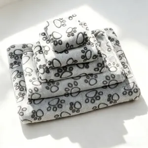 Soft flannel pet blanket with cute paw print design, cozy fleece mat and towel for dogs and cats.